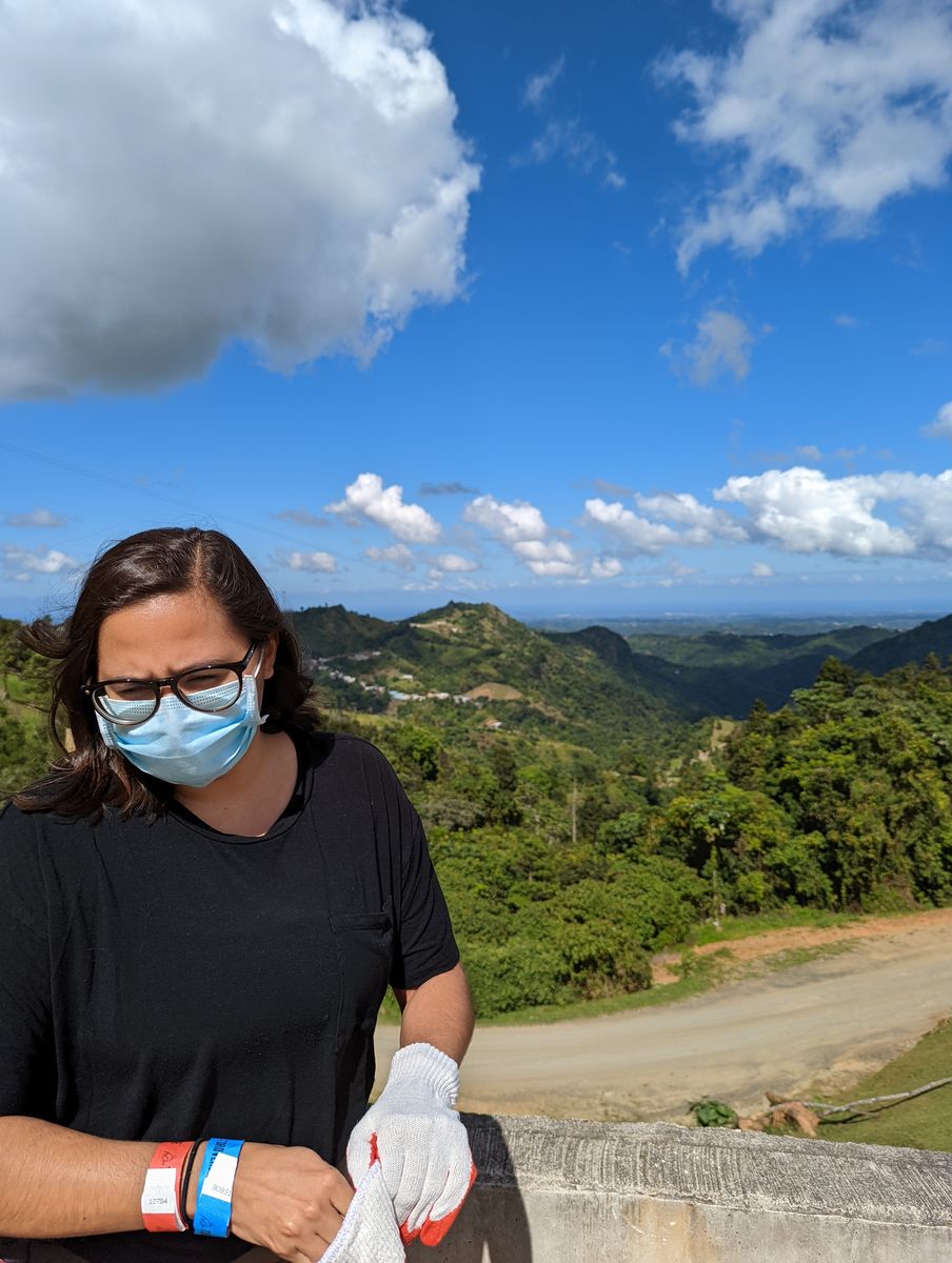 Woman at a lush mountain overlook